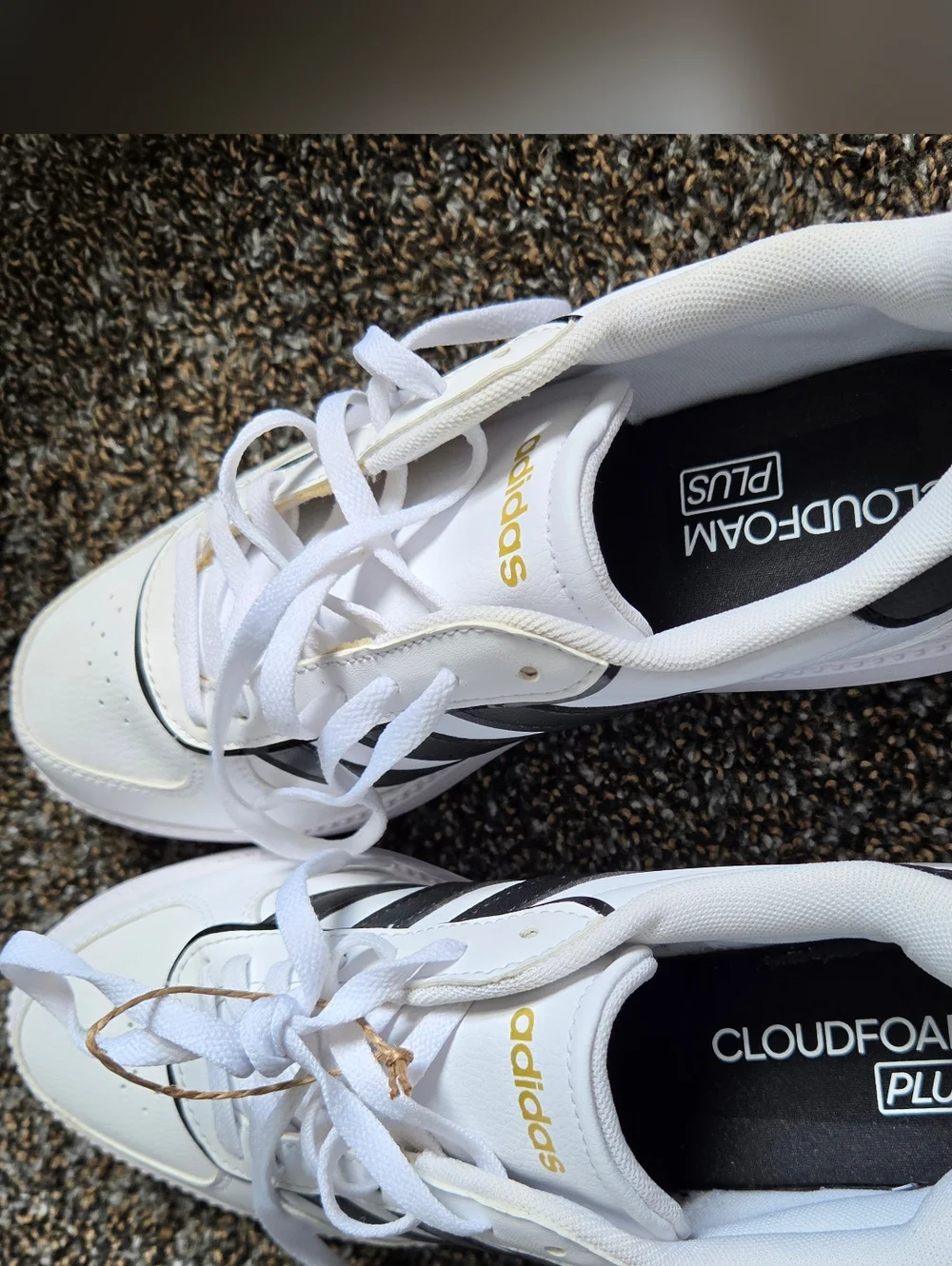 adidas Women’s White Sneakers with Black Stripes and Gold Accents
